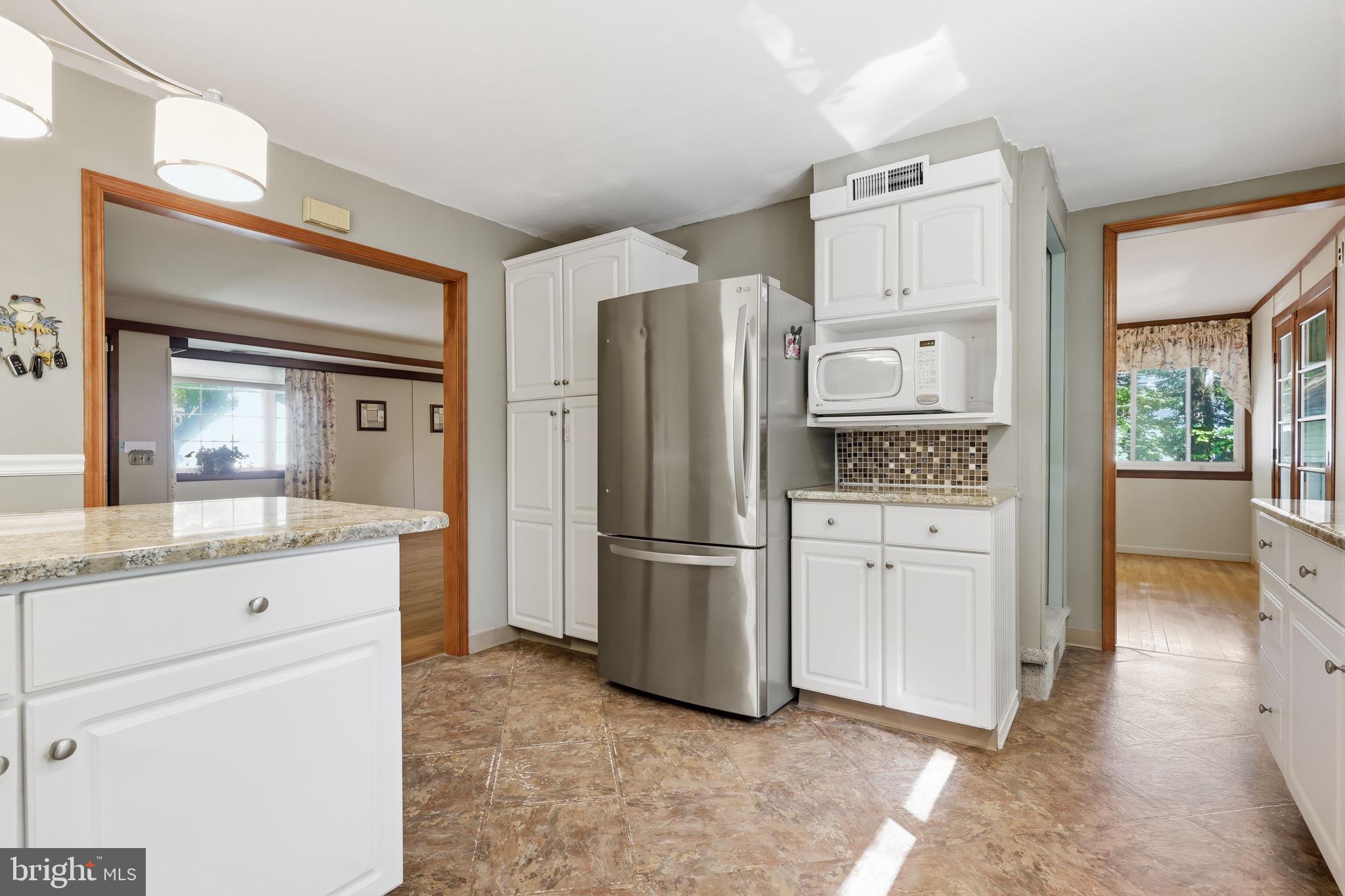 207 West Ferry Road Yardley, PA 19067 - Photo 18 of 50 a kitchen with granite countertop a refrigerator and a sink