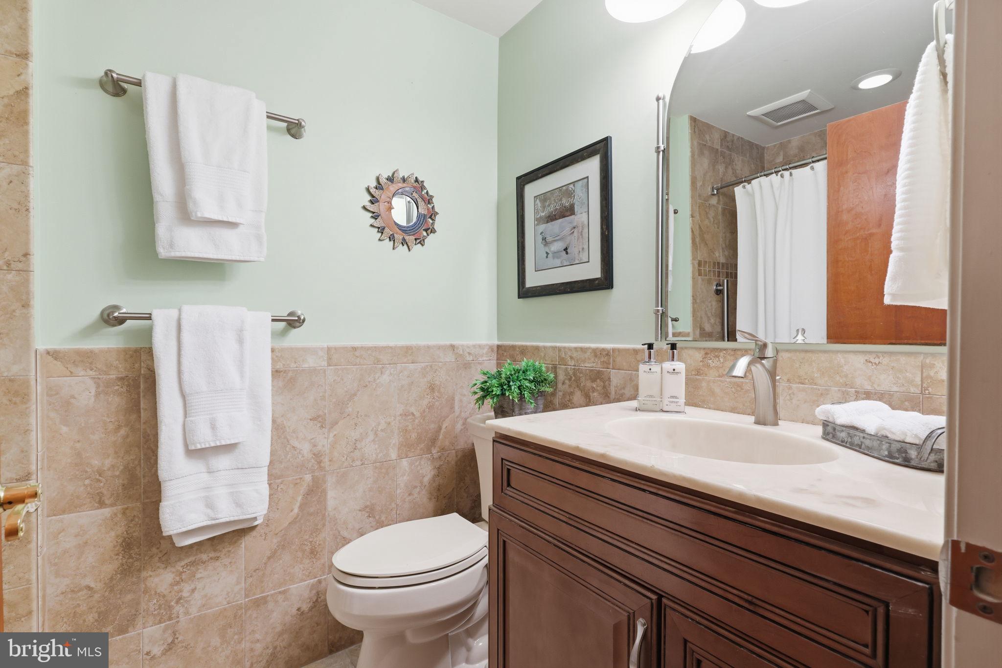 207 West Ferry Road Yardley, PA 19067 - Photo 20 of 50 a bathroom with a granite countertop sink mirror and toilet