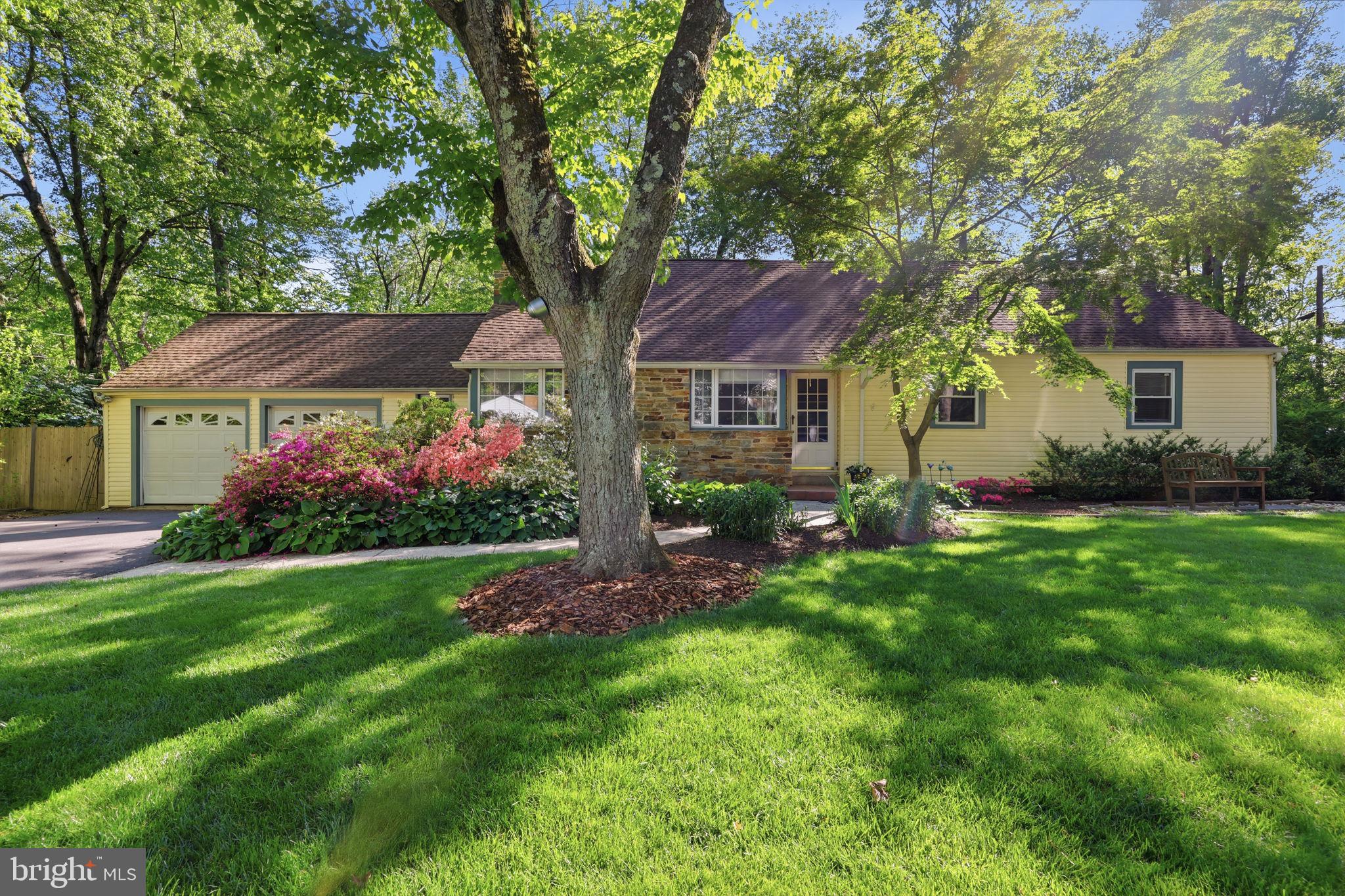 207 West Ferry Road Yardley, PA 19067 - Photo 2 of 50 a front view of a house with a garden