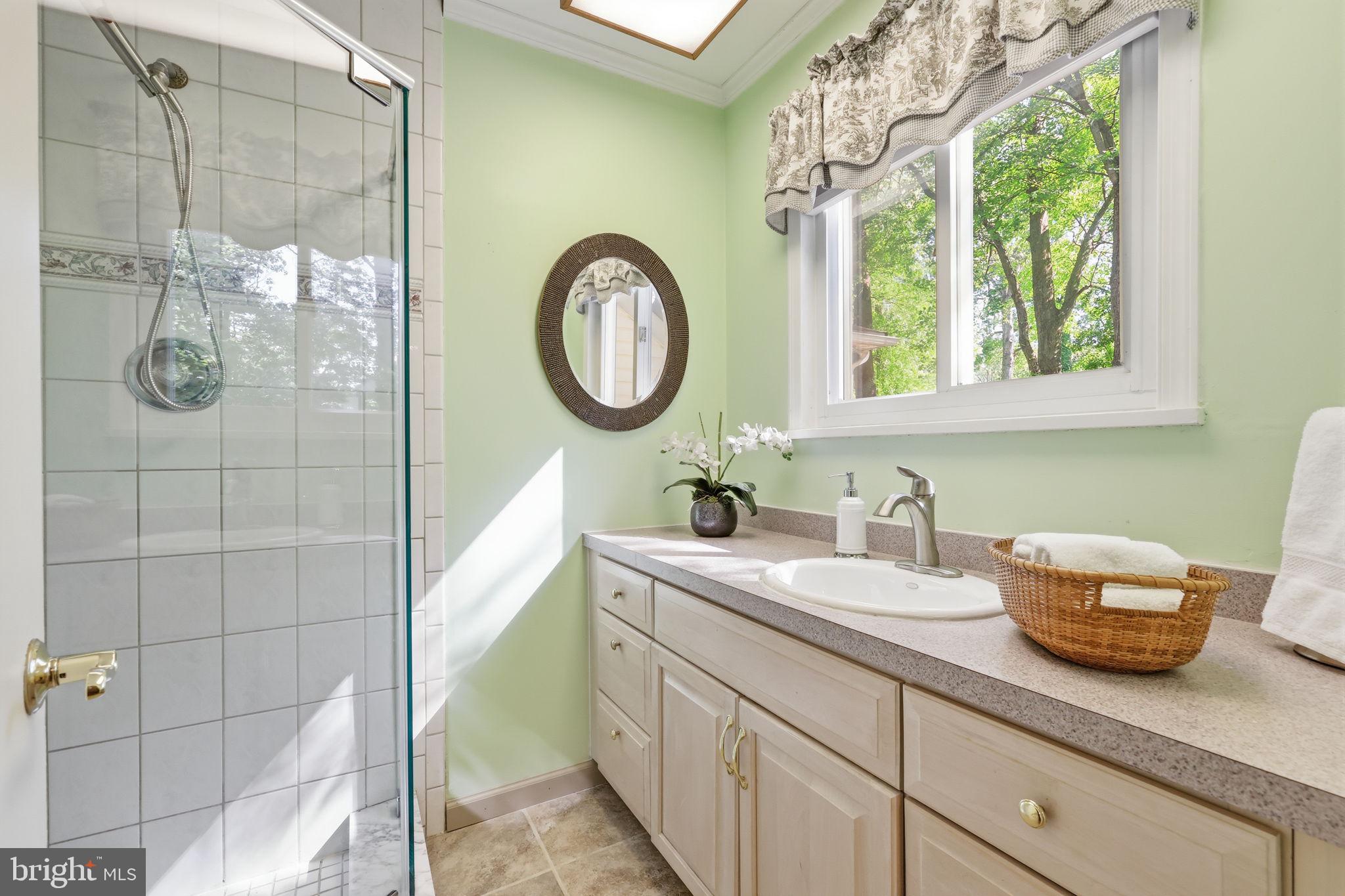 207 West Ferry Road Yardley, PA 19067 - Photo 27 of 50 a bathroom with a granite countertop sink and a large mirror