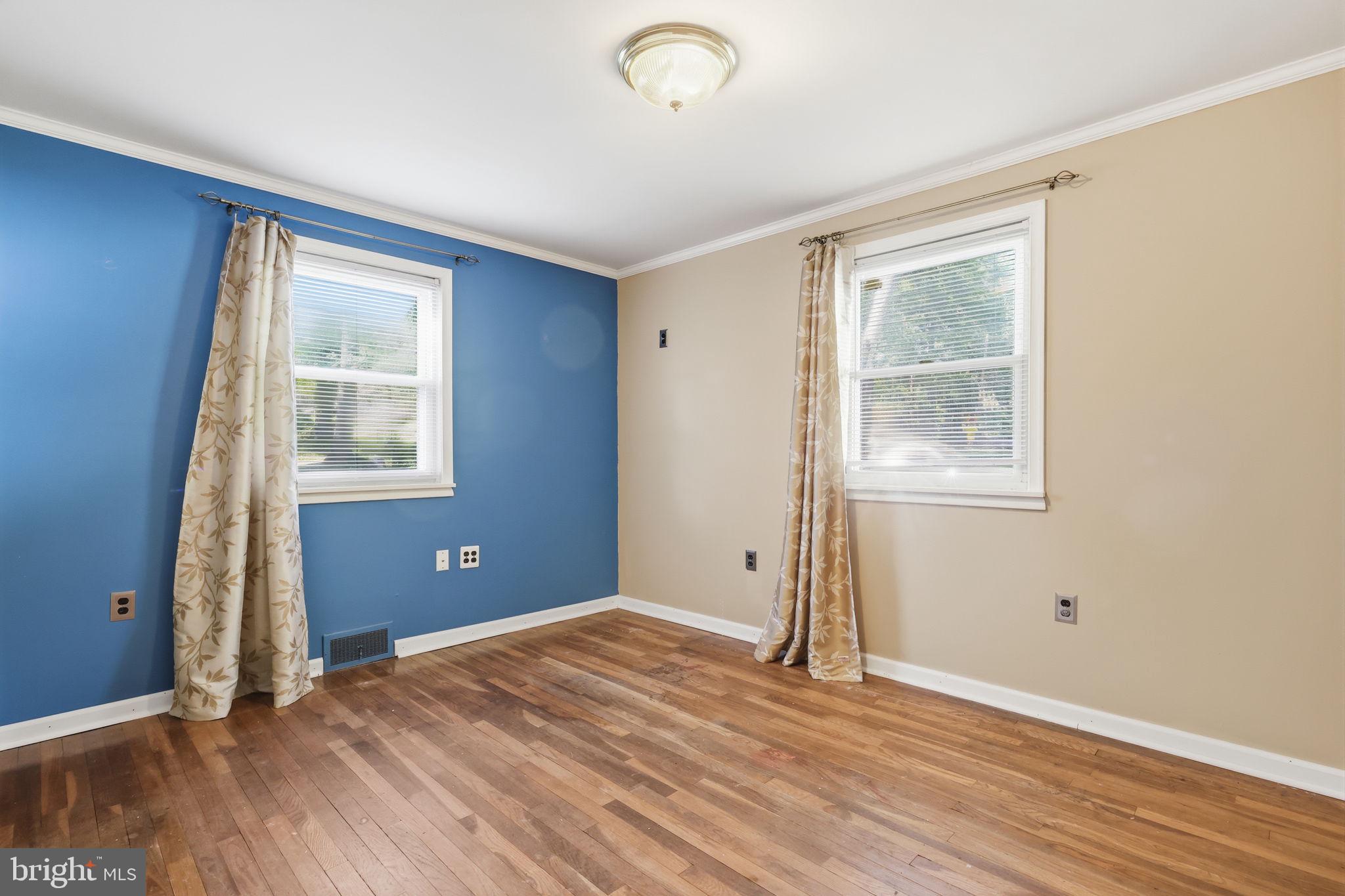207 West Ferry Road Yardley, PA 19067 - Photo 29 of 50 an empty room with wooden floor and windows