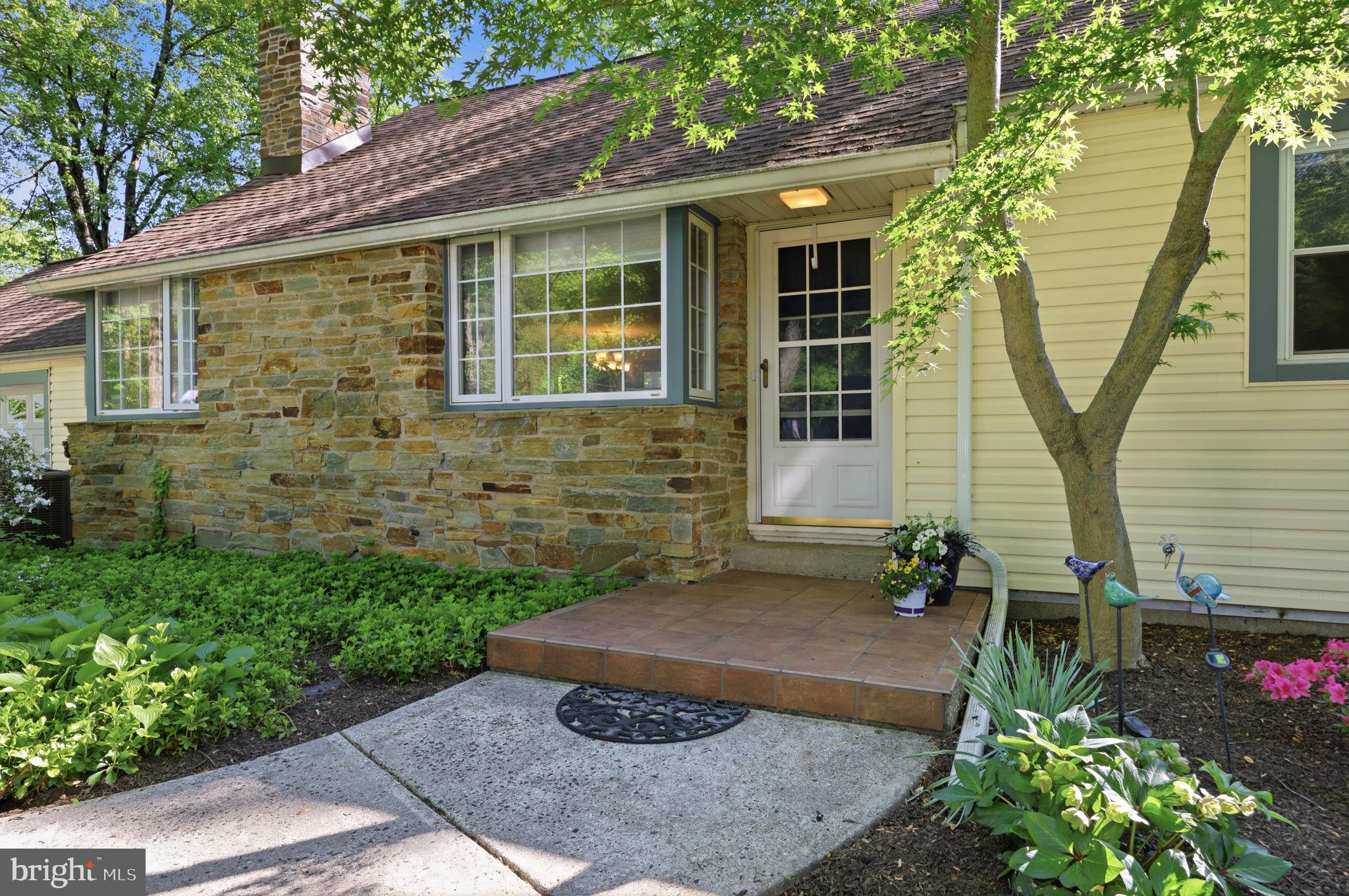 207 West Ferry Road Yardley, PA 19067 - Photo 3 of 50 a front view of a house with garden