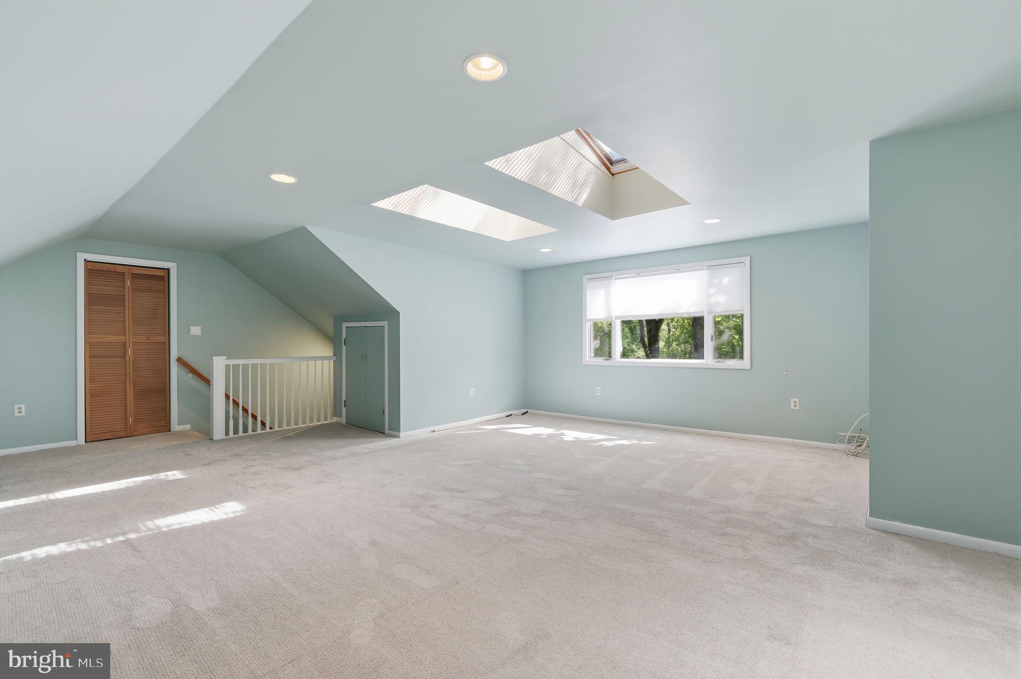 207 West Ferry Road Yardley, PA 19067 - Photo 32 of 50 an empty room with windows and ceiling fan