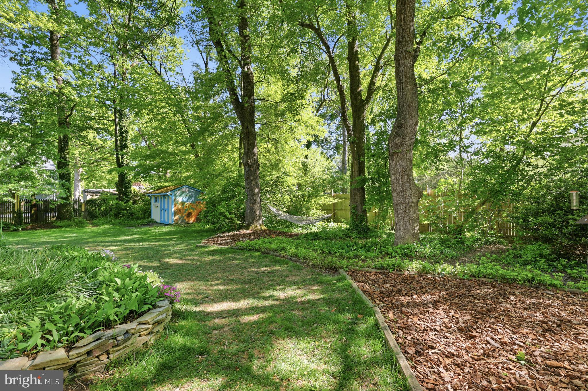 207 West Ferry Road Yardley, PA 19067 - Photo 41 of 50 a view of a backyard with large trees