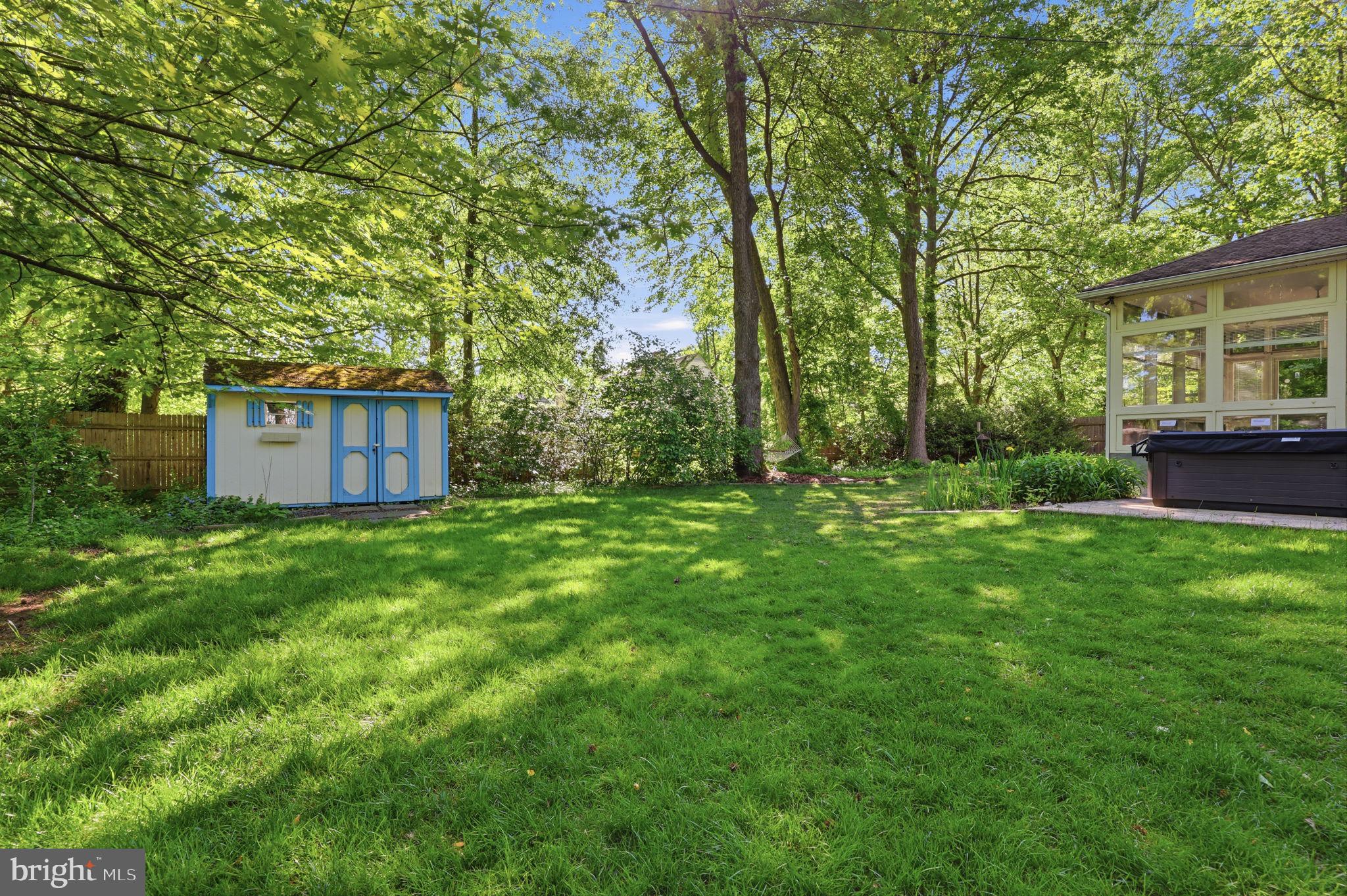 207 West Ferry Road Yardley, PA 19067 - Photo 44 of 50 a view of a backyard with large trees