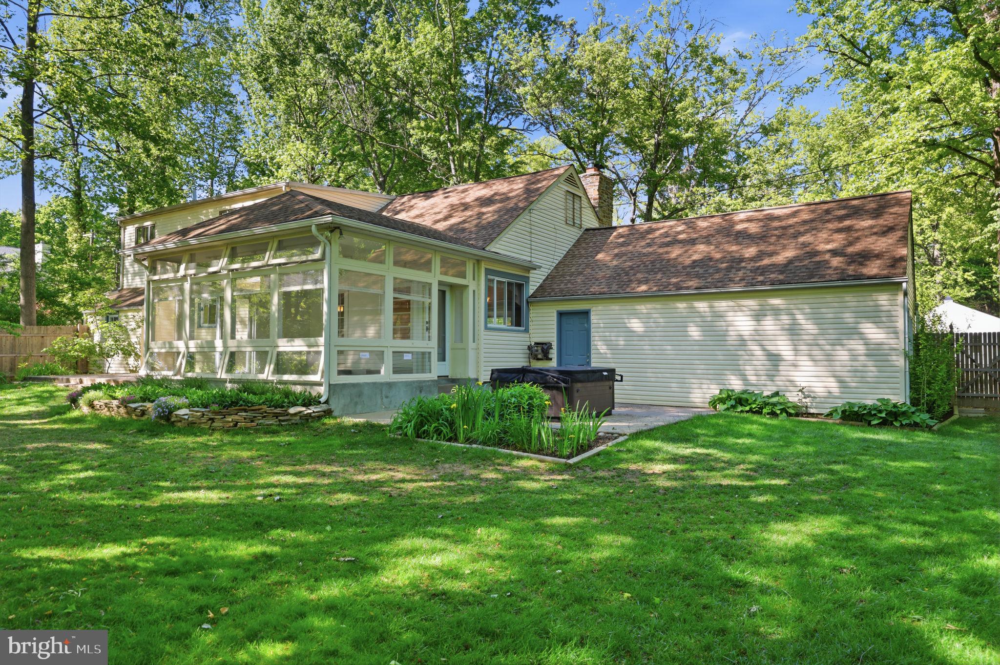 207 West Ferry Road Yardley, PA 19067 - Photo 45 of 50 a front view of a house with a garden