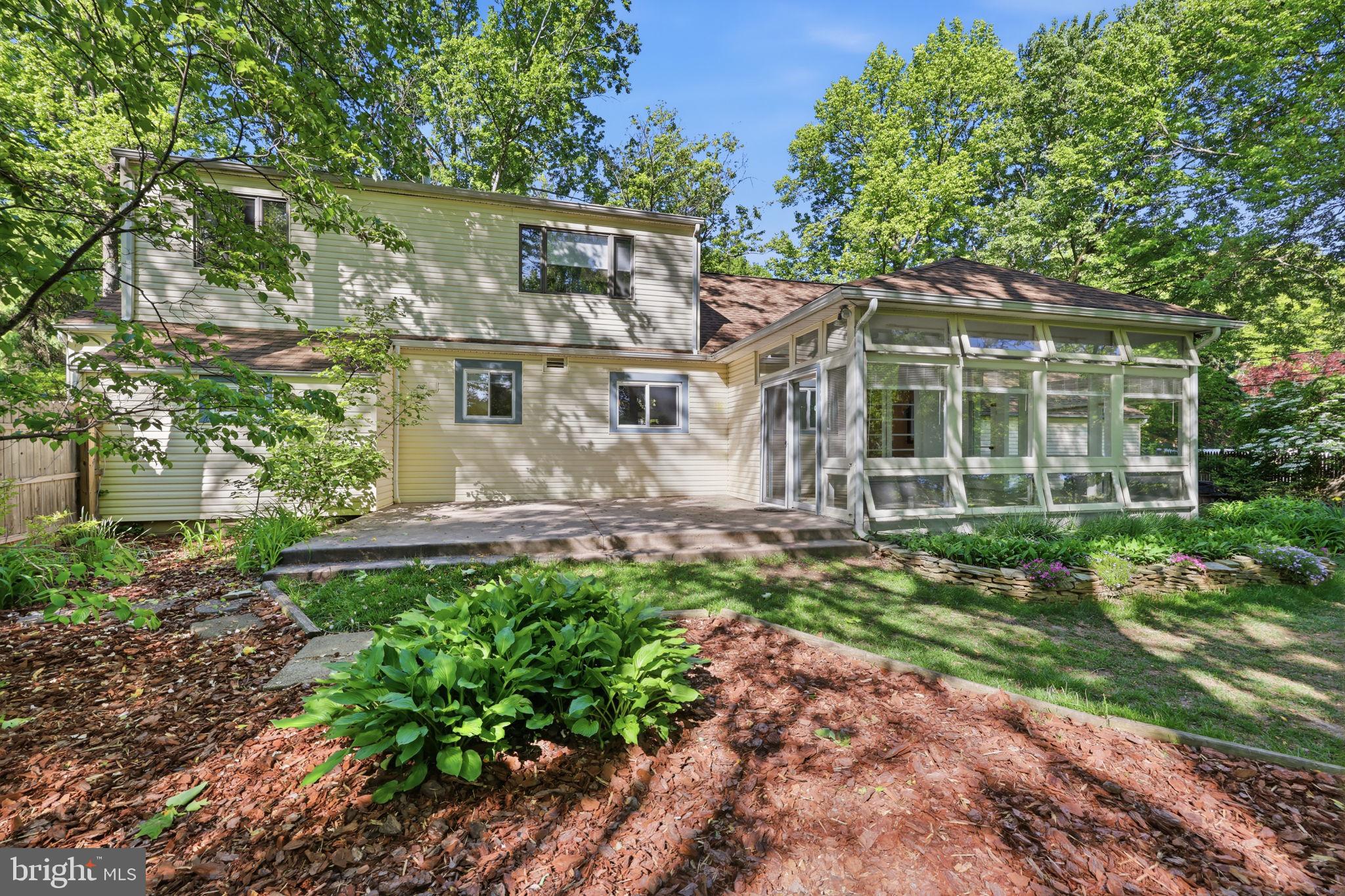 207 West Ferry Road Yardley, PA 19067 - Photo 48 of 50 a front view of a house with a garden