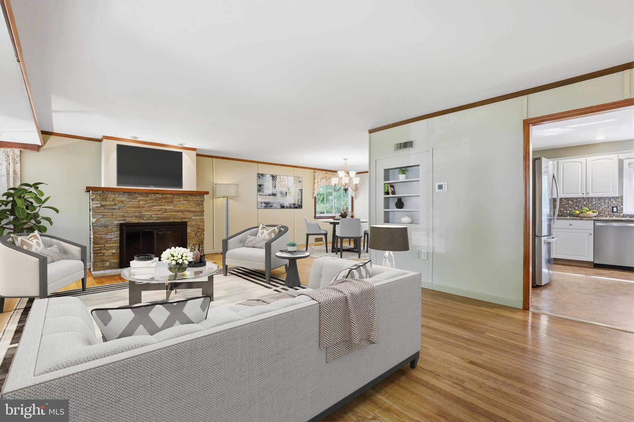 207 West Ferry Road Yardley, PA 19067 - Photo 5 of 50 a living room with furniture wooden floor and a fireplace