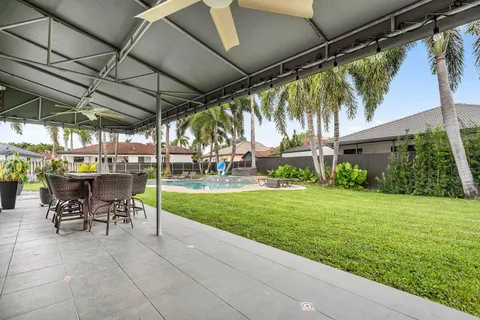 a view of yard with patio