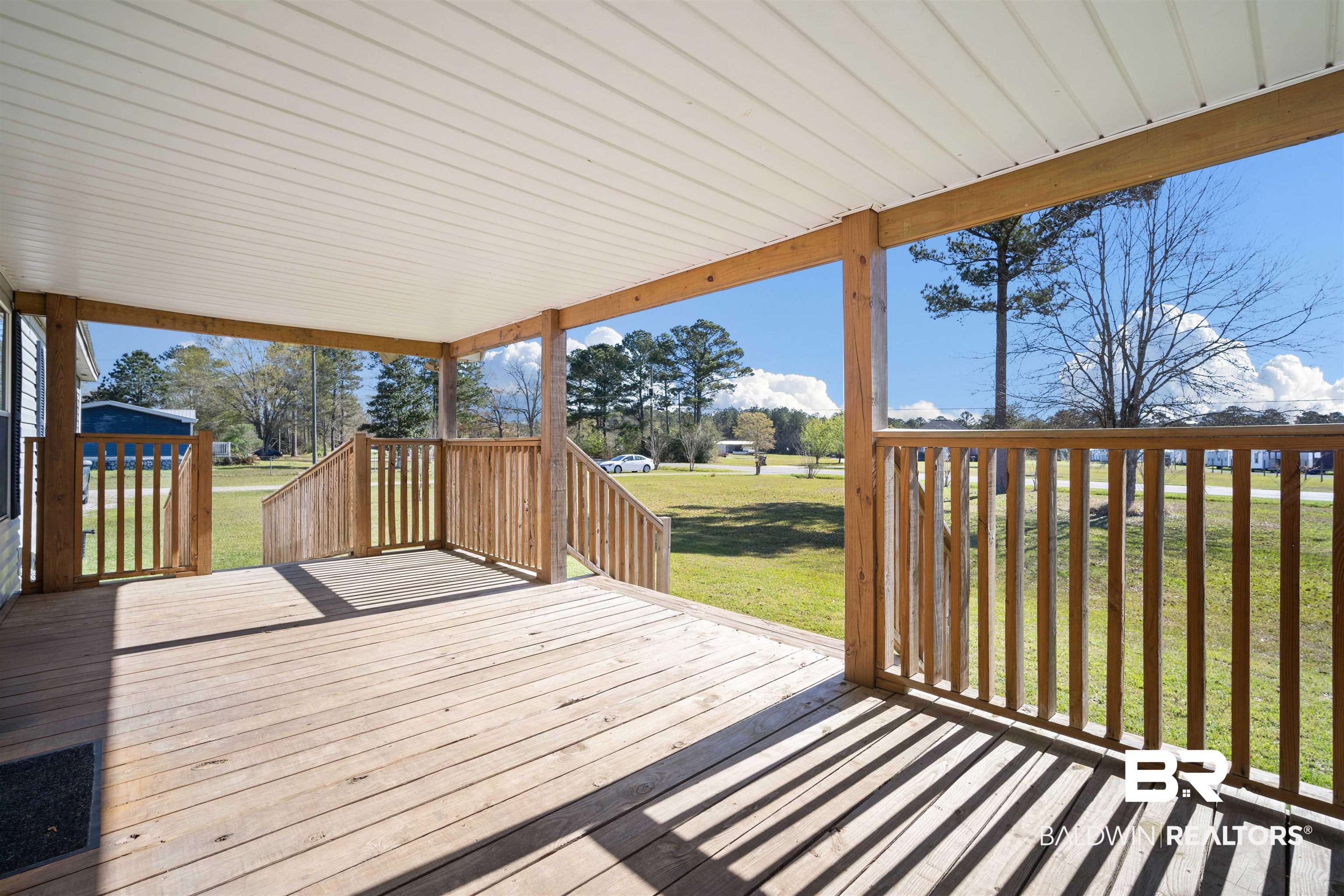9011 Wilmer Georgetown Road Wilmer, AL 36587 - Photo 5 of 34 Wooden terrace featuring a yard
