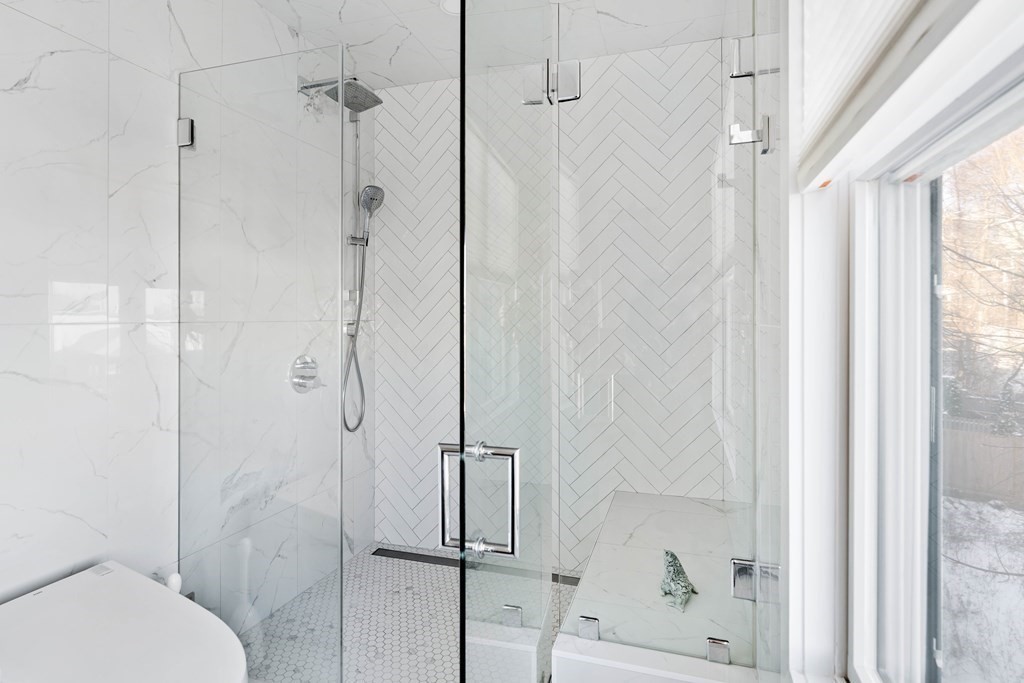 33 Summit Avenue, Unit 33 Brookline, MA 02446 - Photo 19 of 28 a bathroom with a shower and a toilet