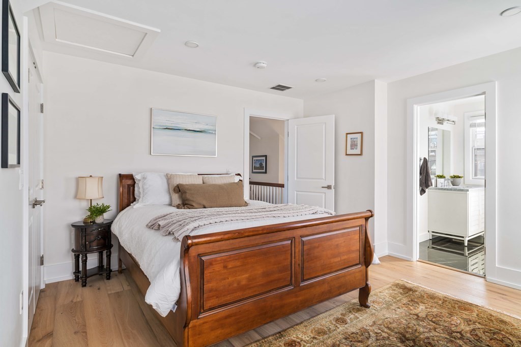 33 Summit Avenue, Unit 33 Brookline, MA 02446 - Photo 25 of 28 a bed room with a bed and a television