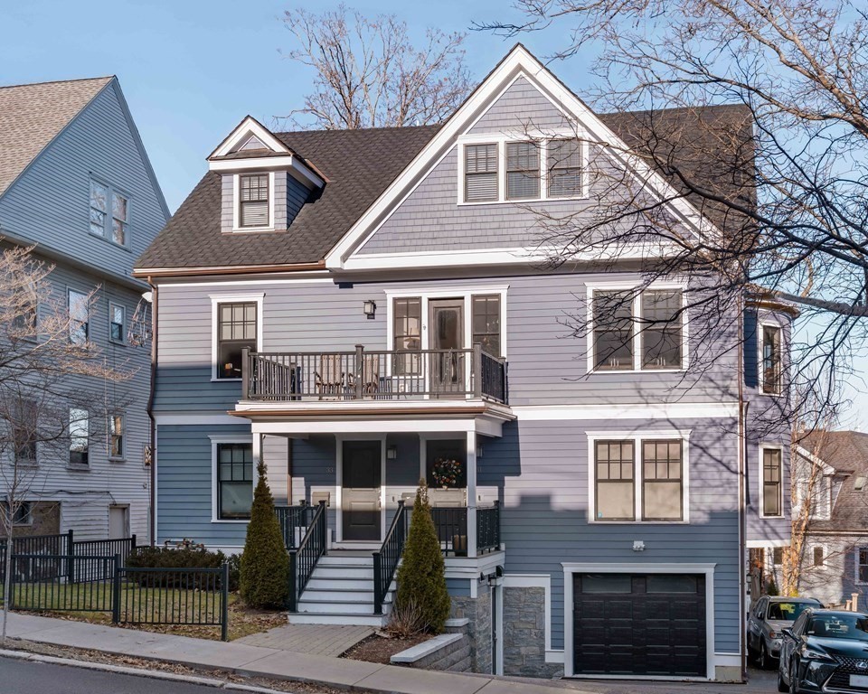 33 Summit Avenue, Unit 33 Brookline, MA 02446 - Photo 28 of 28 a front view of a house with glass windows