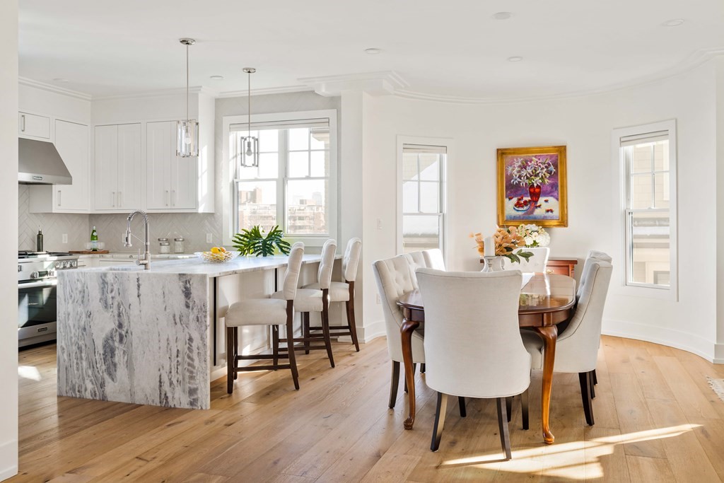 33 Summit Avenue, Unit 33 Brookline, MA 02446 - Photo 8 of 28 a view of a dining room with furniture and wooden floor