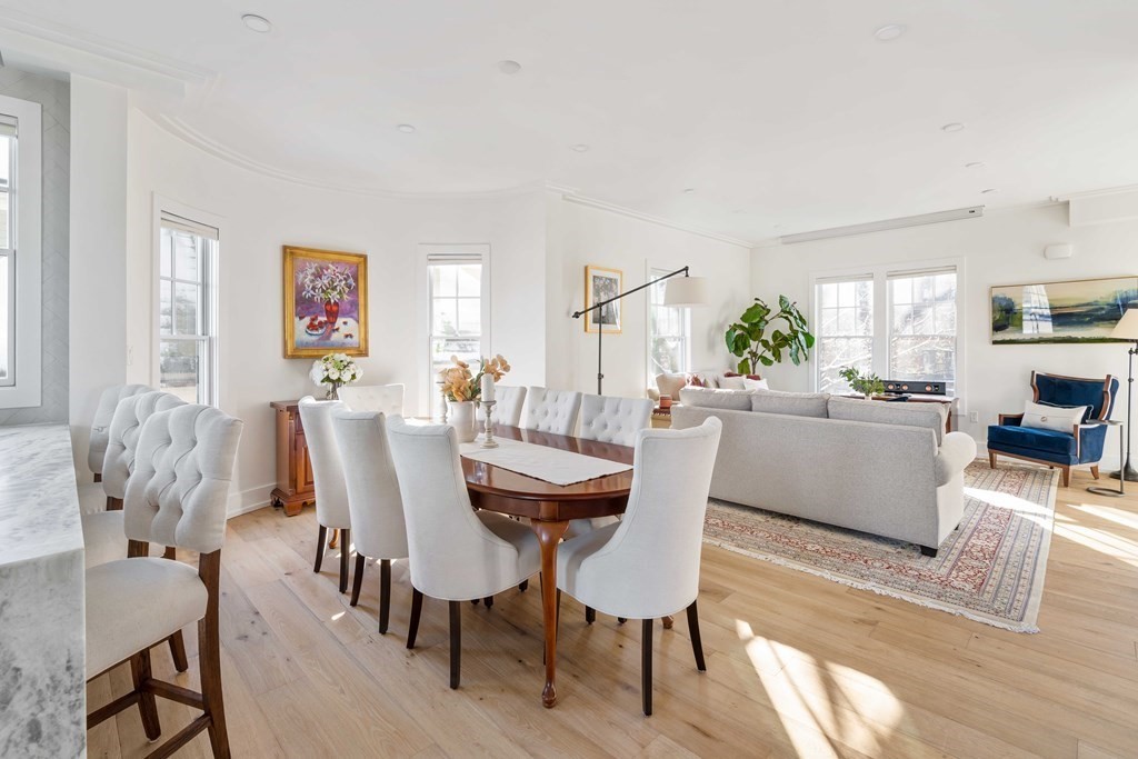 33 Summit Avenue, Unit 33 Brookline, MA 02446 - Photo 9 of 28 a view of a dining room with furniture and wooden floor
