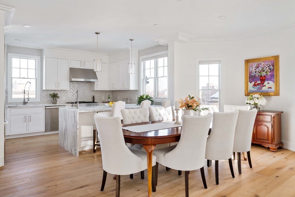 33 Summit Avenue, Unit 33 Brookline, MA 02446 - Photo 10 of 28 a view of a dining room with furniture and wooden floor