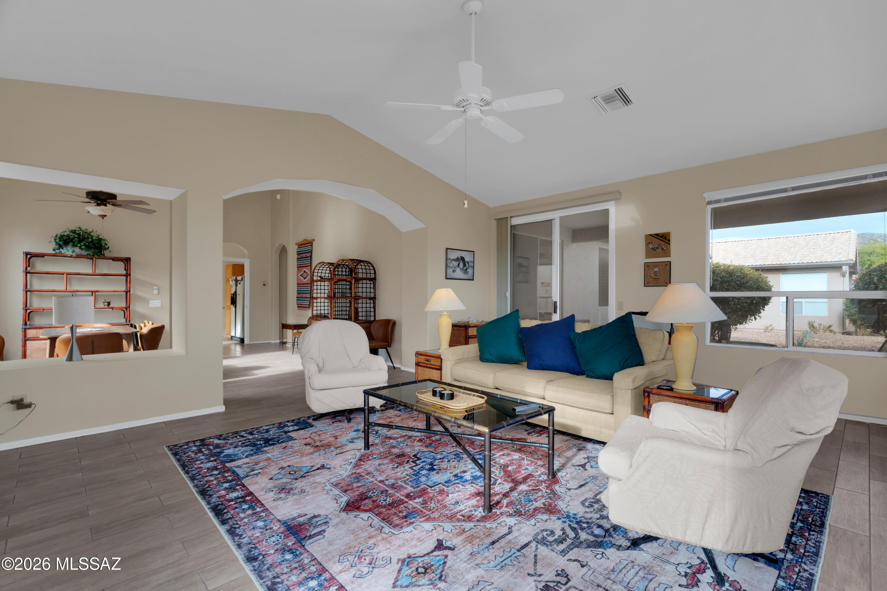 64351 East Wind Ridge Circle Tucson, AZ 85739 - Photo 10 of 41 a living room with furniture and a rug