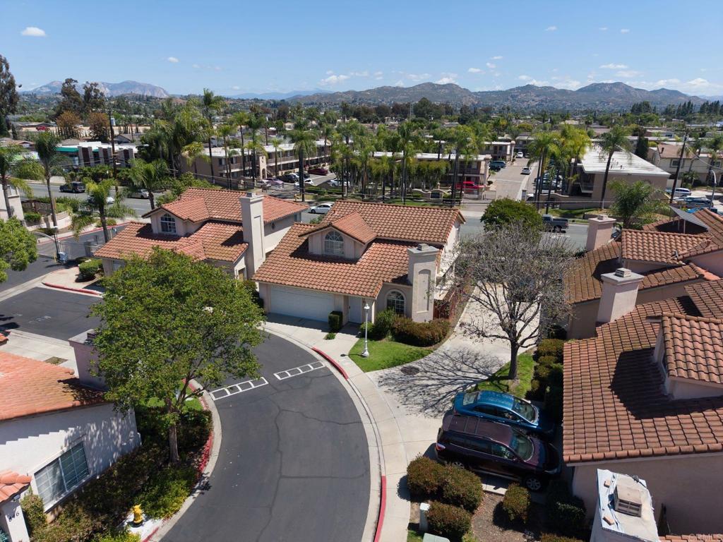 841 Friendly Circle El Cajon, CA 92021 - Photo 19 of 20 an aerial view of a city with lots of residential buildings ocean and mountain view in back