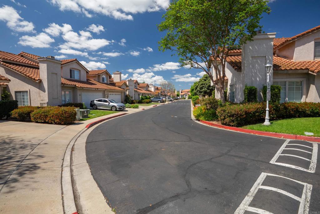 841 Friendly Circle El Cajon, CA 92021 - Photo 4 of 20 a view of a street with houses