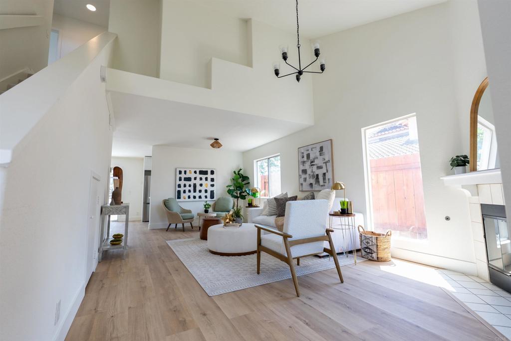 841 Friendly Circle El Cajon, CA 92021 - Photo 5 of 20 a living room with furniture and a wooden floor