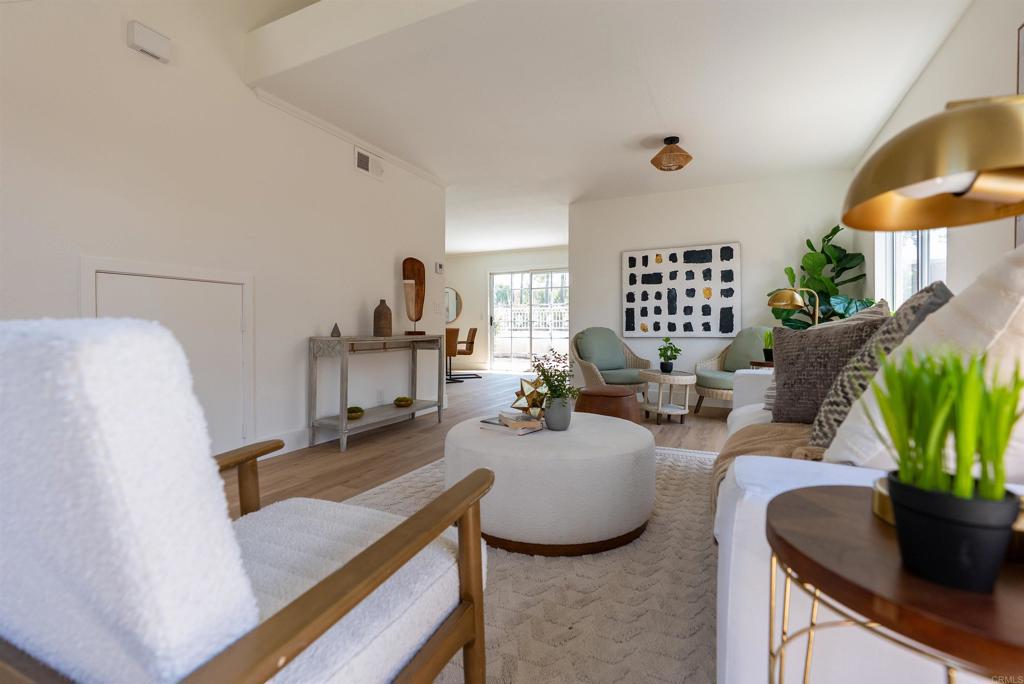 841 Friendly Circle El Cajon, CA 92021 - Photo 6 of 20 a living room with furniture potted plant and a table