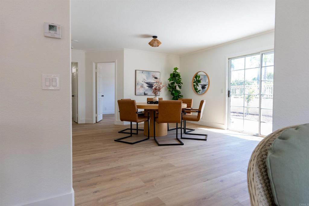 841 Friendly Circle El Cajon, CA 92021 - Photo 7 of 20 a view of a dining room with furniture and a window