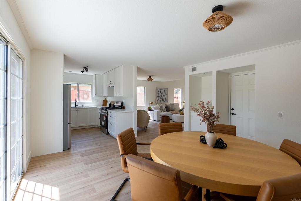 841 Friendly Circle El Cajon, CA 92021 - Photo 8 of 20 a view of a dining room with furniture and a window