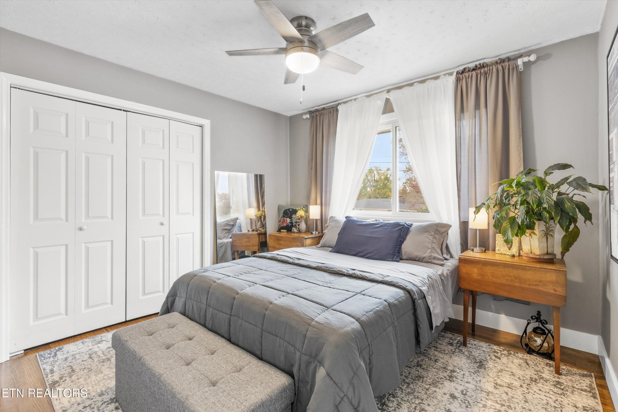 7919 North Forest Road Knoxville, TN 37909 - Photo 15 of 29 a bedroom with a bed and a window