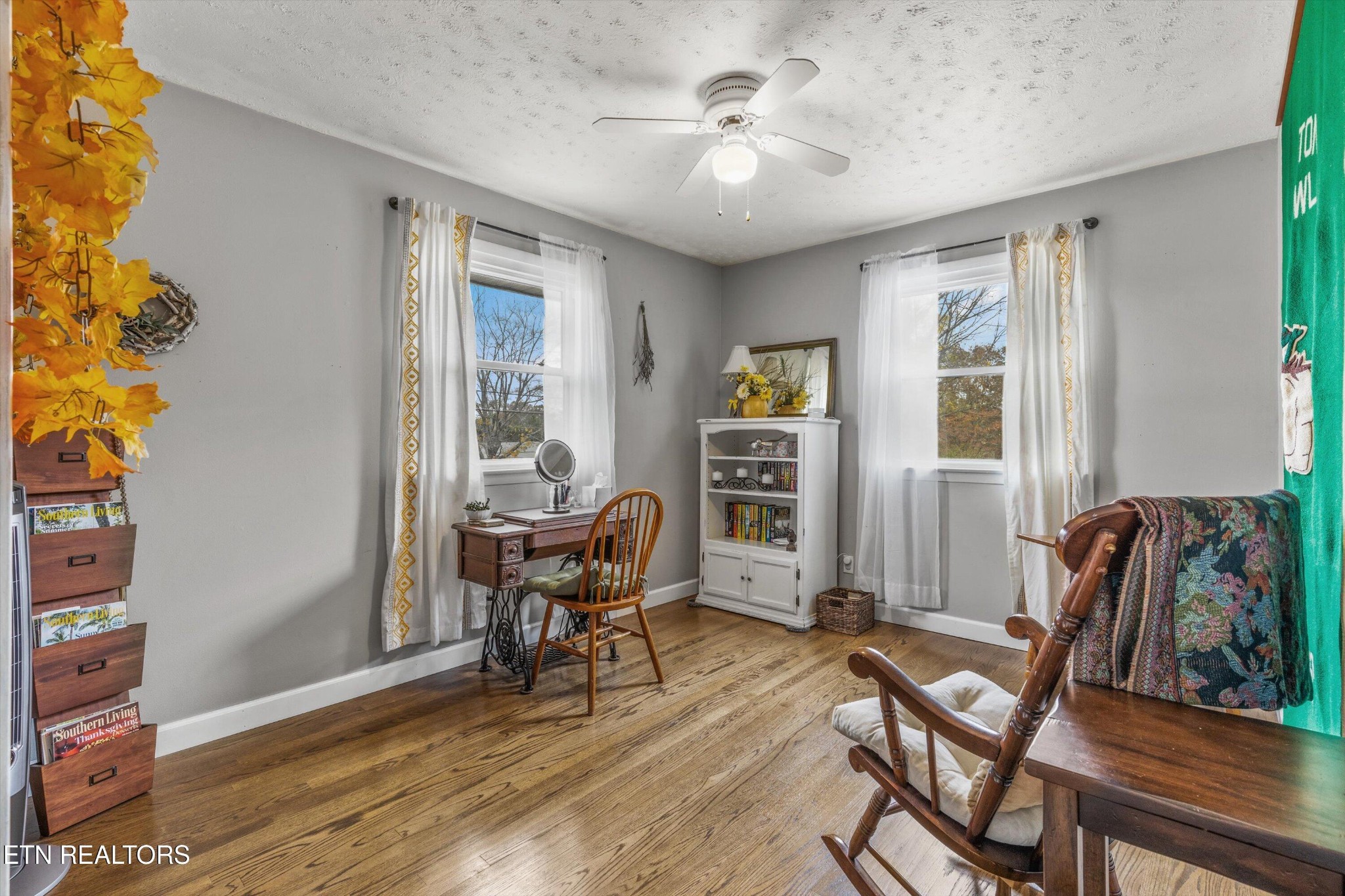 7919 North Forest Road Knoxville, TN 37909 - Photo 16 of 29 a view of a livingroom with furniture and a window