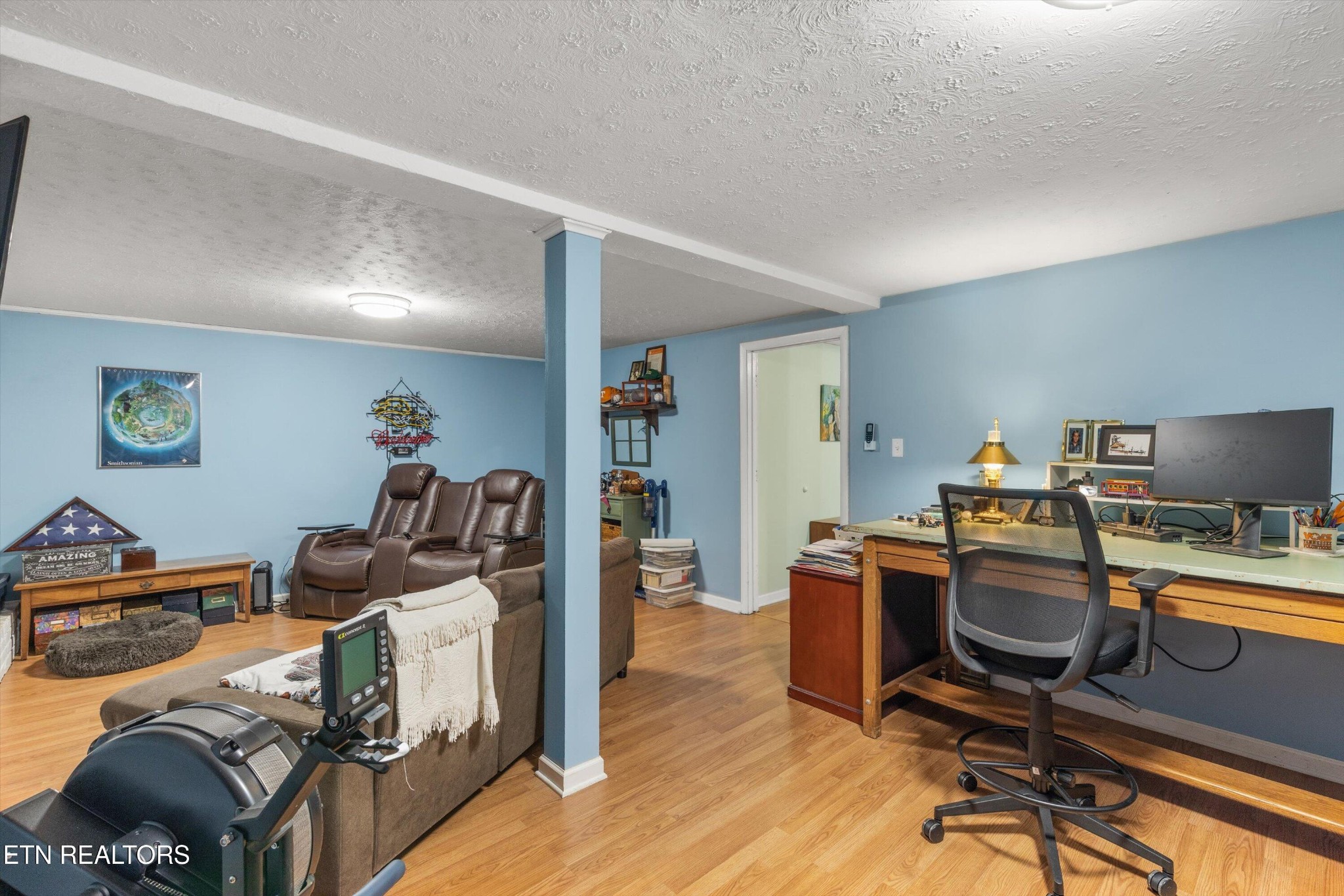 7919 North Forest Road Knoxville, TN 37909 - Photo 23 of 29 a view of a workspace with furniture and a bedroom
