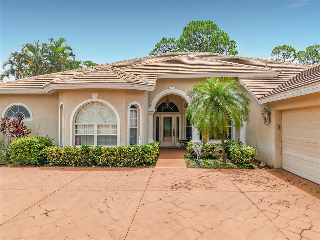 2221 Oxford Ridge Circle Lehigh Acres, FL 33973 - Photo 1 of 98