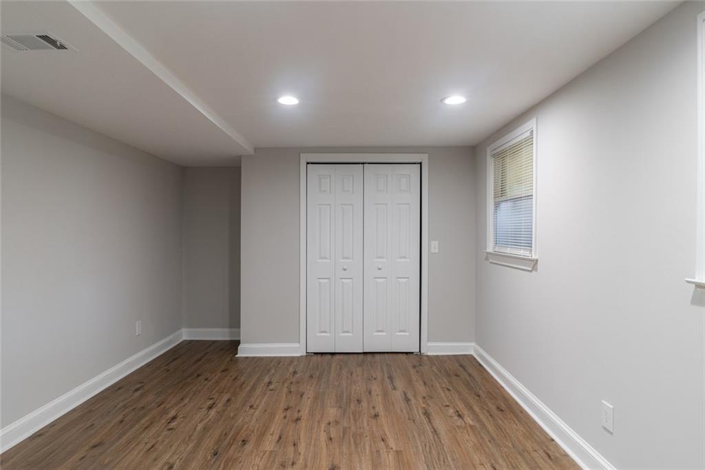 3599 Lower Roswell Road Marietta, GA 30068 - Photo 40 of 64 a view of an empty room with wooden floor