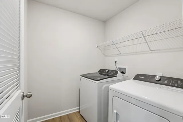 a bathroom with a granite countertop toilet a sink and a bathtub