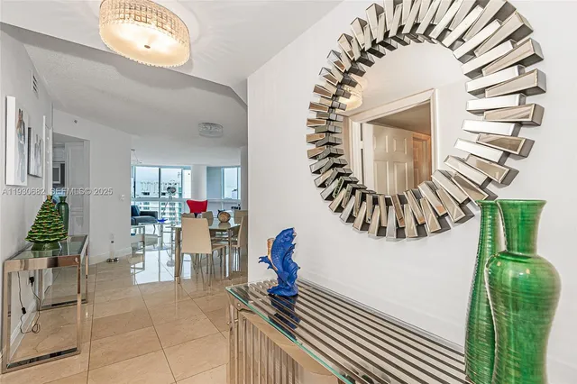 a view of entryway wih livingroom and stairs