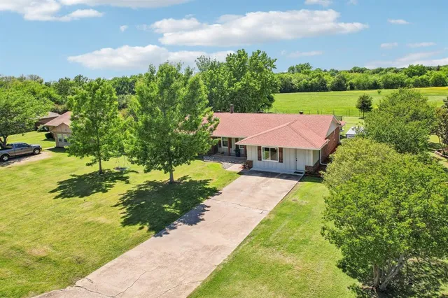 a view of a house with garden