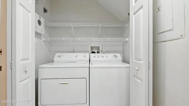 a utility room with dryer and washer