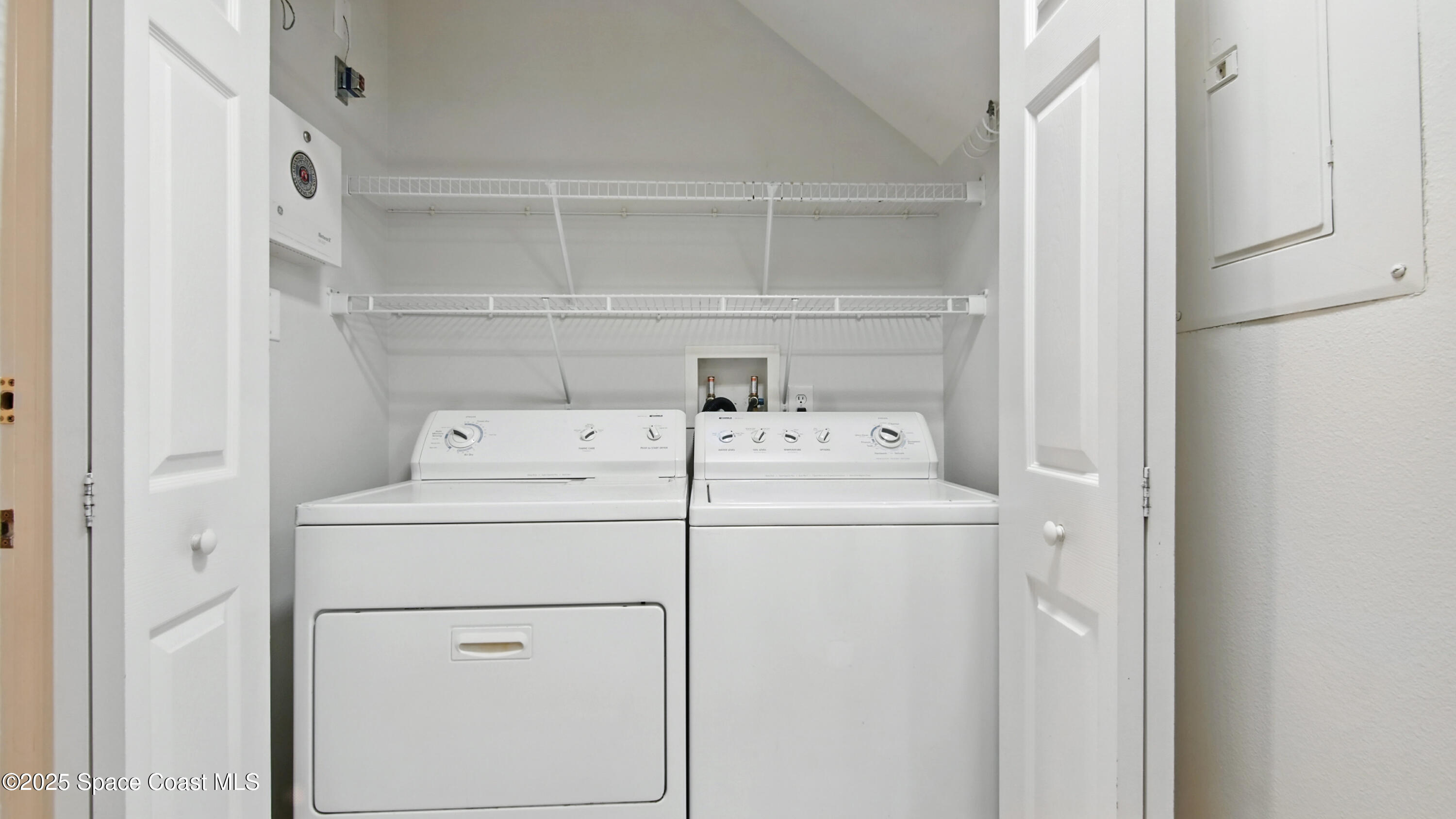 1160 Luminary Circle, Unit 105 Melbourne, FL 32901 - Photo 13 of 16 a utility room with dryer and washer