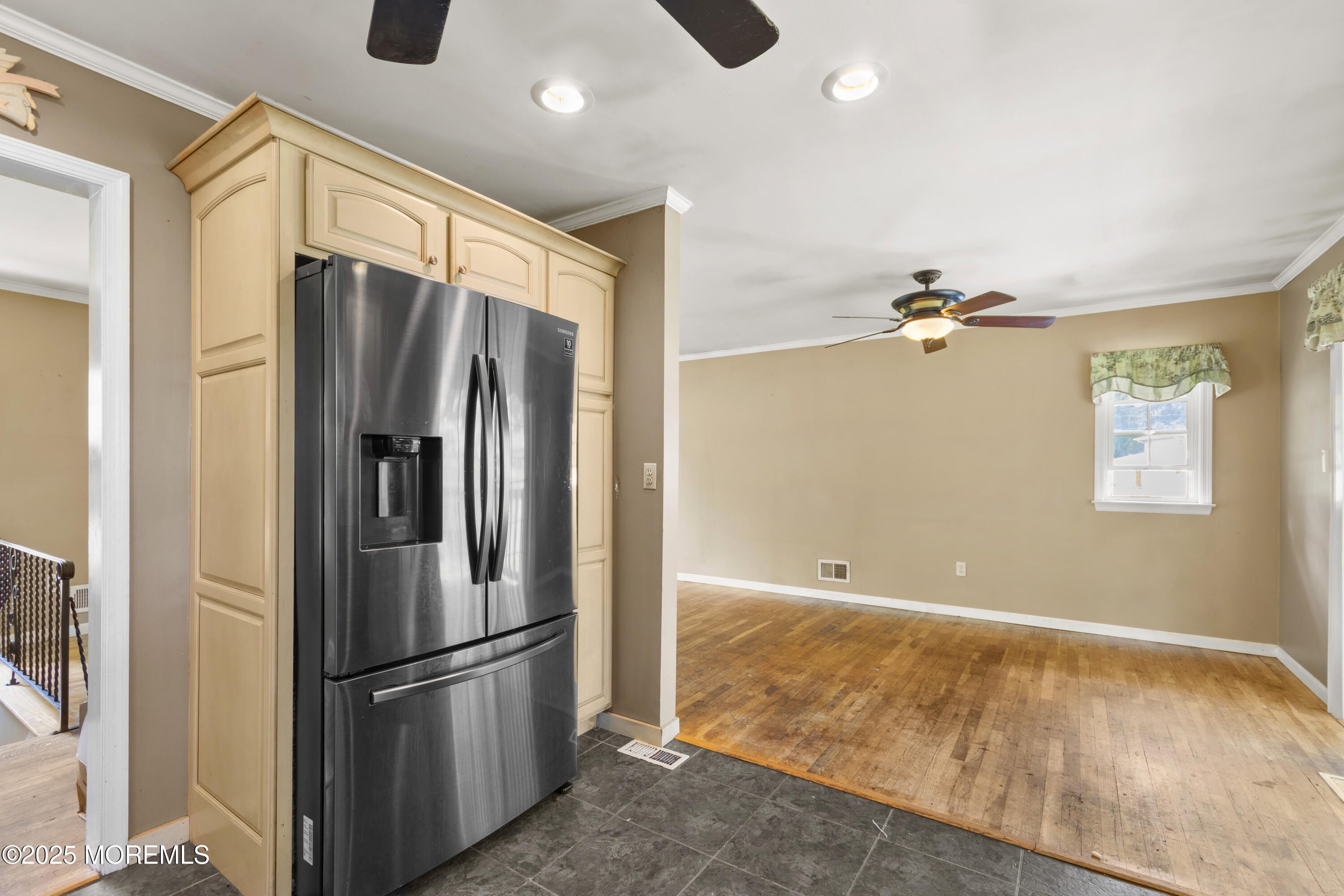 44 Koenig Lane Freehold, NJ 07728 - Photo 12 of 22 a kitchen with stainless steel appliances granite countertop a refrigerator and a sink