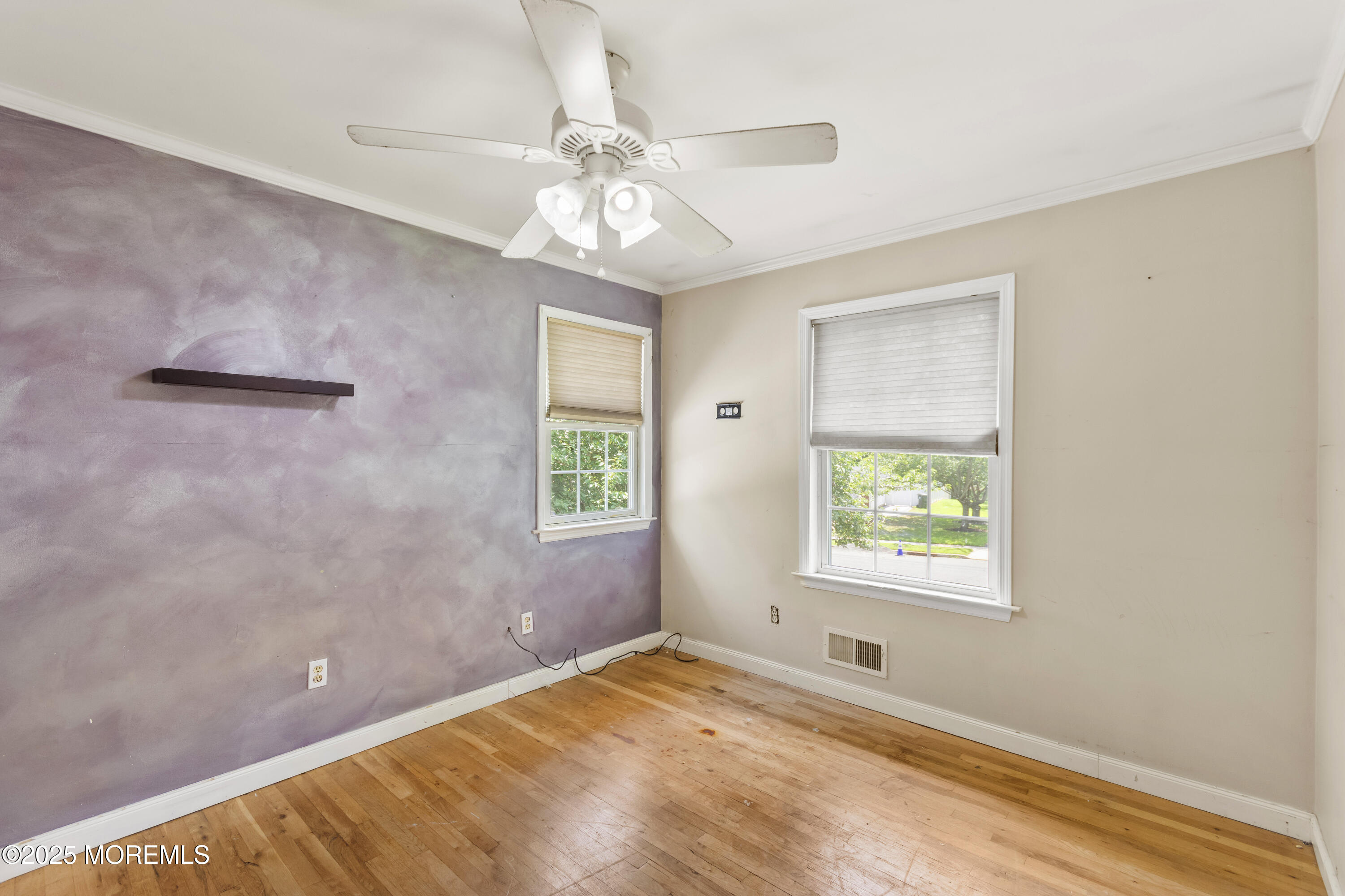 44 Koenig Lane Freehold, NJ 07728 - Photo 14 of 22 a view of an empty room with a window