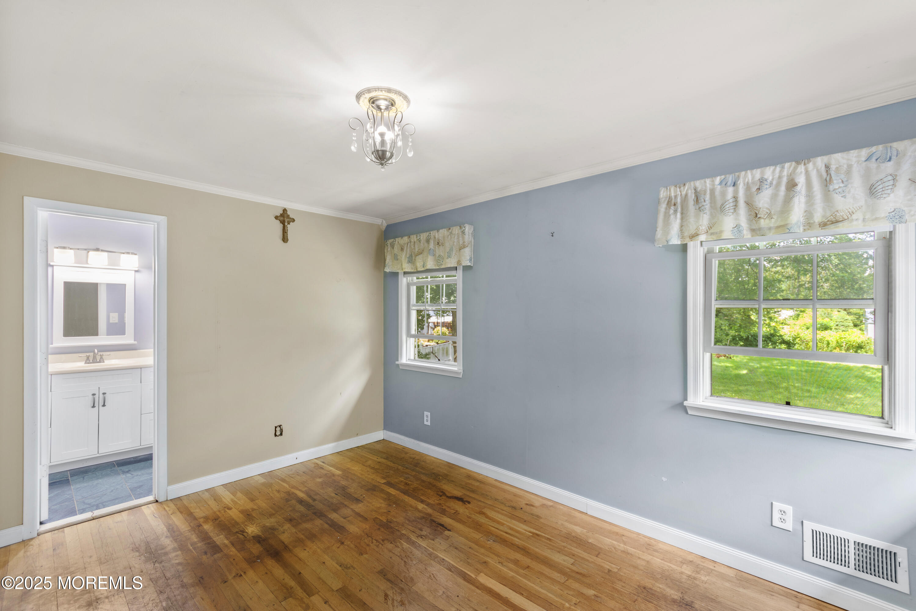44 Koenig Lane Freehold, NJ 07728 - Photo 16 of 22 a view of an empty room with a window
