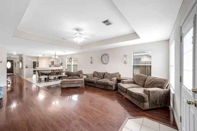 a living room with furniture and a couch