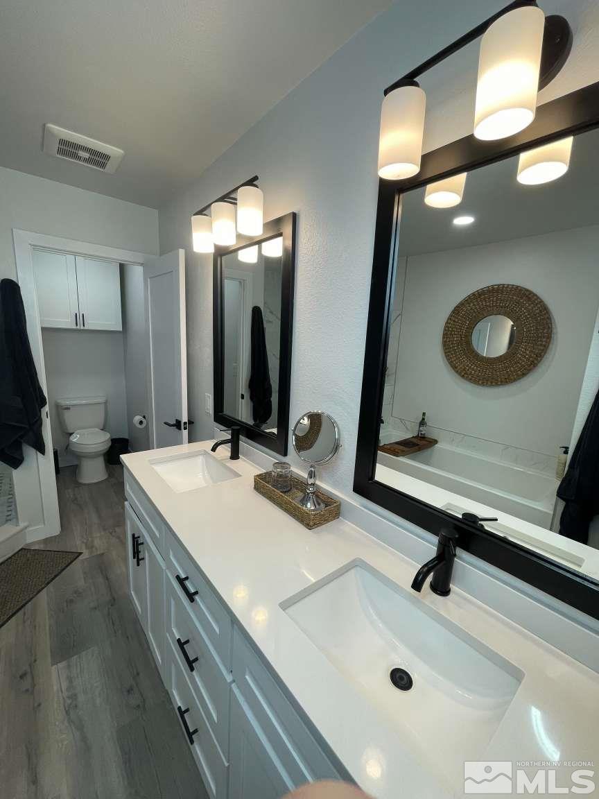 3900 Alcorn Road Fallon, NV 89406 - Photo 8 of 40 a bathroom with a sink and a mirror