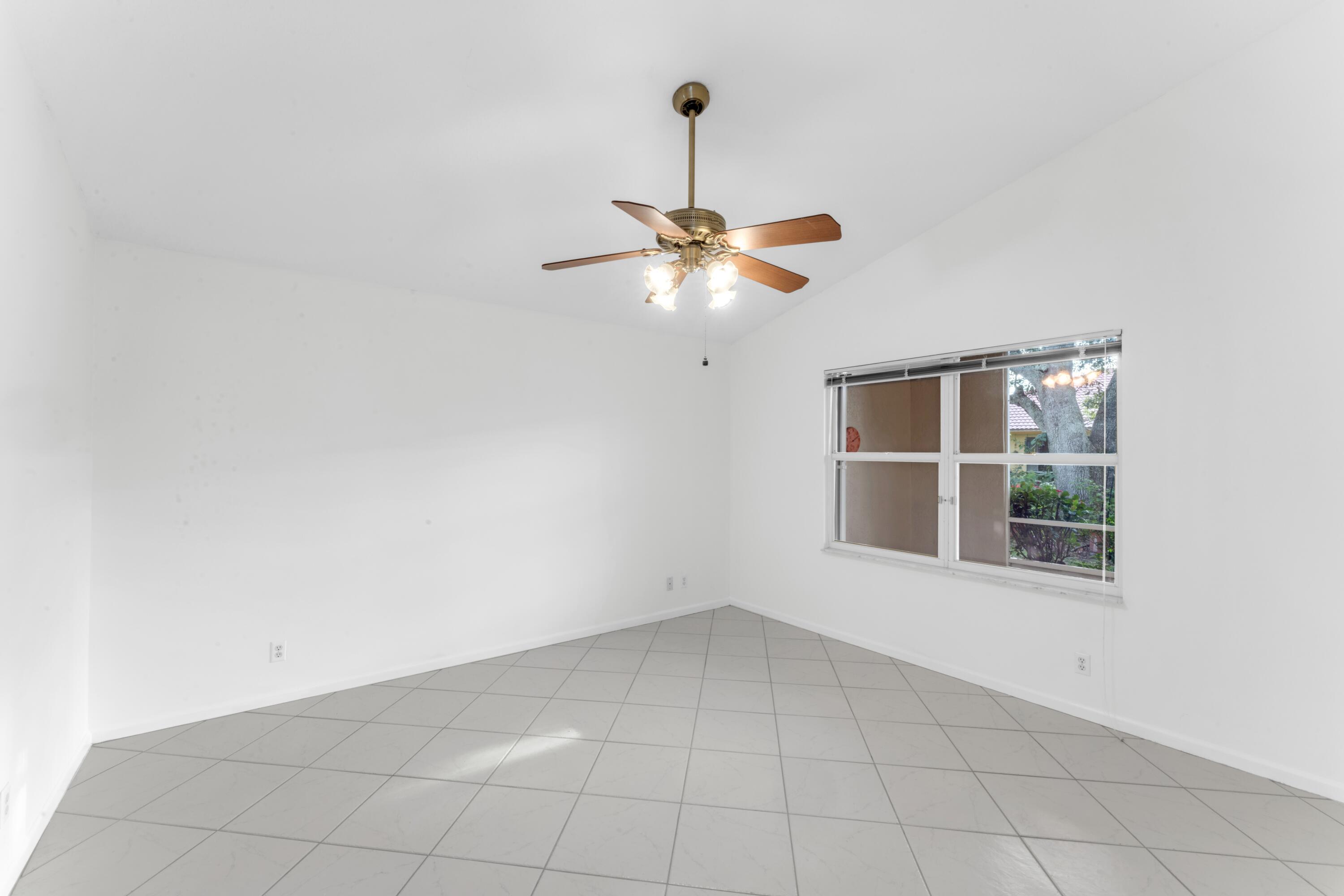 2705 Pointe Circle Greenacres, FL 33413 - Photo 15 of 46 Primary bedroom