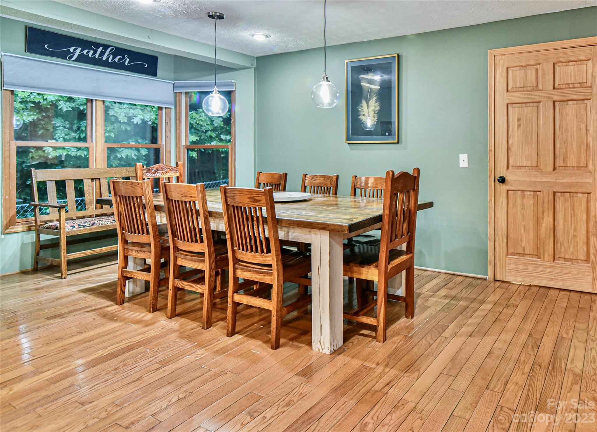 32 Magic Mountain Road Candler, NC 28715 - Photo 17 of 44 a dining room with furniture window wooden floor