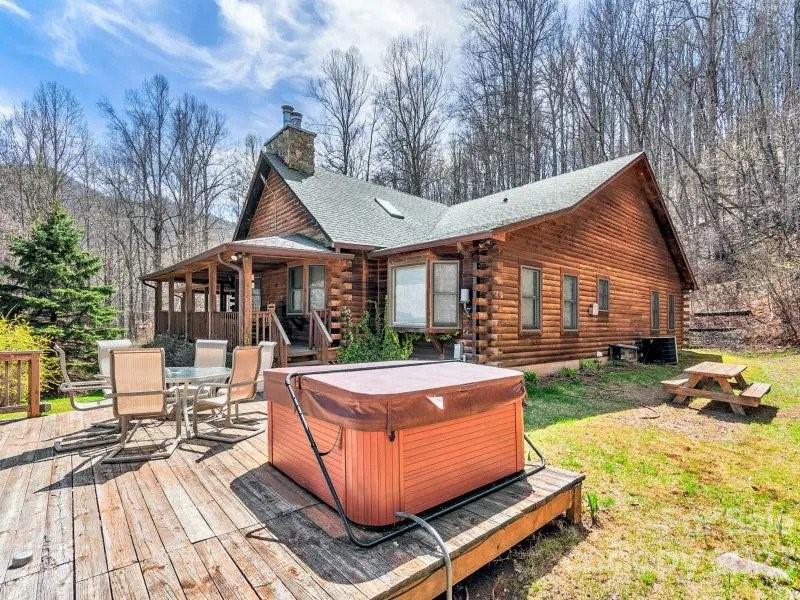 32 Magic Mountain Road Candler, NC 28715 - Photo 3 of 44 a view of outdoor space yard deck and patio