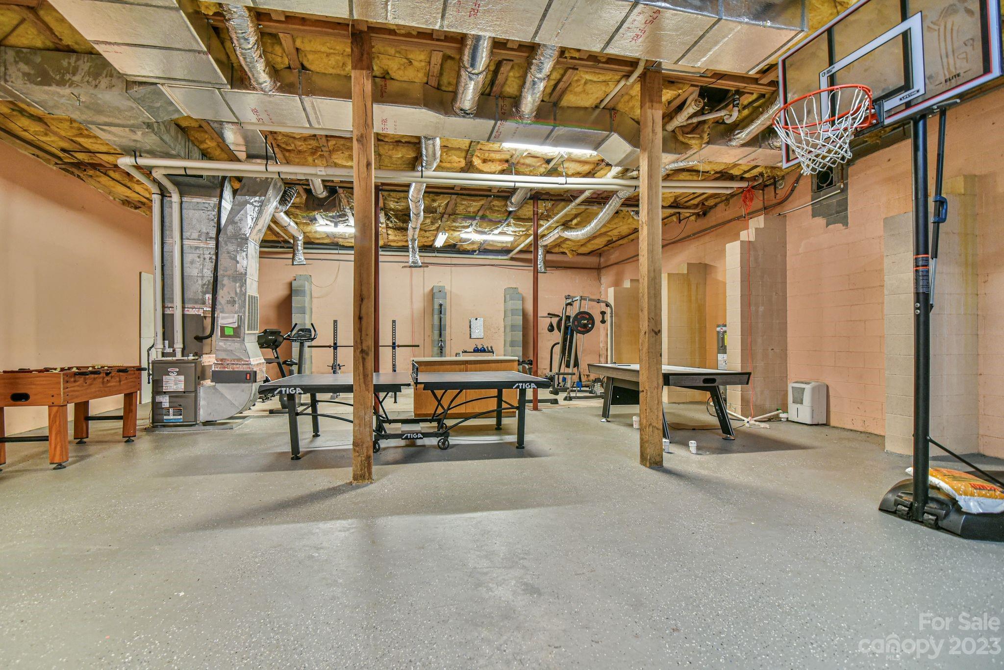 32 Magic Mountain Road Candler, NC 28715 - Photo 37 of 44 a view of a room with gym equipment