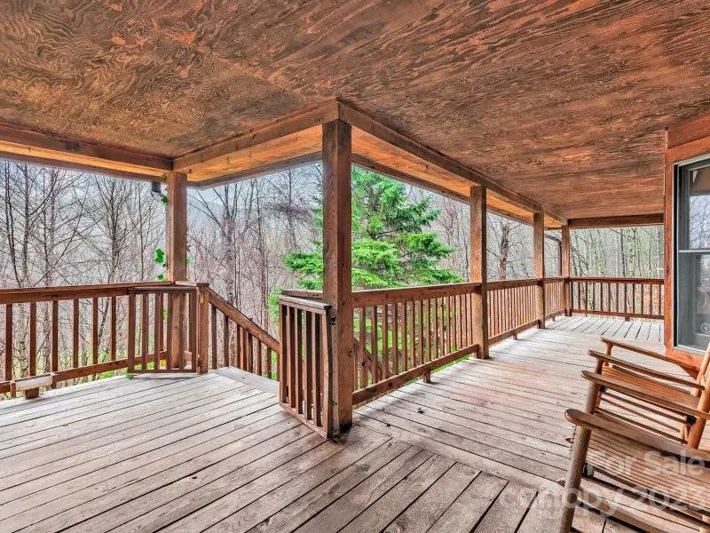 32 Magic Mountain Road Candler, NC 28715 - Photo 5 of 44 a balcony with wooden floor in balcony
