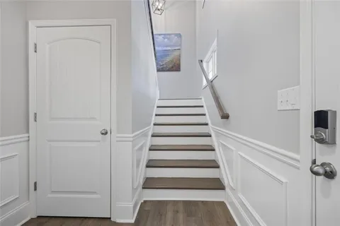 a view of entryway with wooden floor
