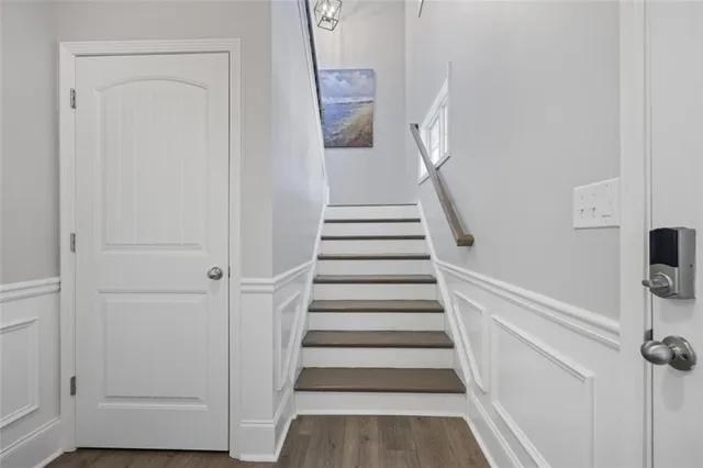 a view of entryway with wooden floor