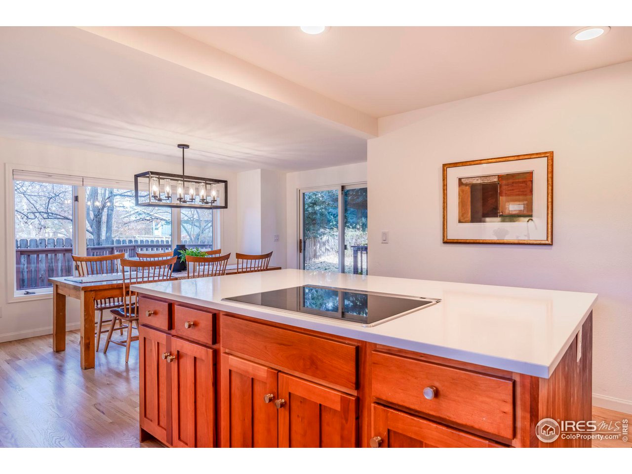 5332 Spotted Horse Trail Boulder, CO 80301 - Photo 13 of 40 a kitchen with stainless steel appliances granite countertop a sink and a refrigerator